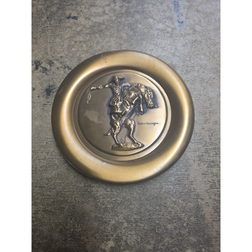 FREDERIC REMINGTON'S BRONZE COLLECTORS PLATE THE BRONCO BUSTER